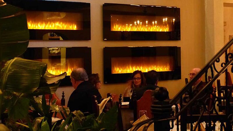 First floor dining room with view of people dining